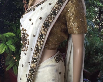 Ivory Crepe Banarasi Saree ; Bronze Sequin Bootis