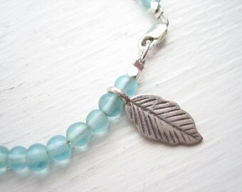 Sterling silver and glass bracelet, recycled glass bead, aqua glass bracelet, Hill Tribe silver, silver leaf charm, aqua bead bracelet