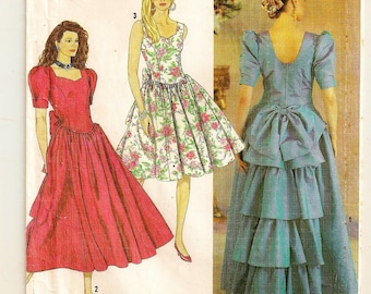 A Princess Seam, Sweetheart Neckline, Sleeveless/Short Sleeve, Back Ruffled Dress Pattern for Women: Uncut- Sizes 4-6-8-10 • Simplicity 7057
