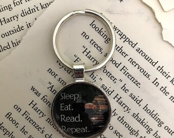 Eat, Sleep, Read, Repeat Pendant