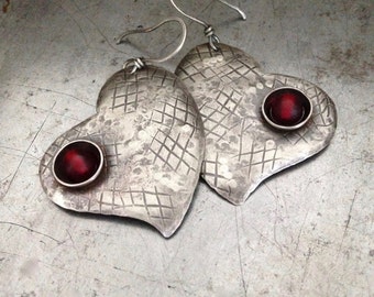 Silver heart earrings with red Czech glass, rustic textured handmade earrings
