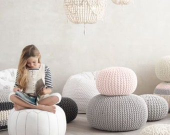 Super soft poufs made of knitted ribbon yarn. Cozy poufs for the interior. Knitted poof. Soft furniture.