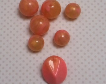 Set of peach/pink marbled beads