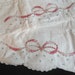 Vintage pillowcases, hand embroidered with crochet edging