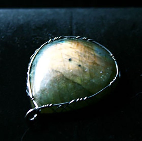 Labradorite pendant with a sterling silver Celtic wrap