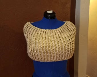This light brown/taupe, soft texture, and elegant hand crocheted capelet.