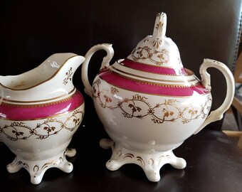 purple/white/gold creamer and lidded sugar bowl
