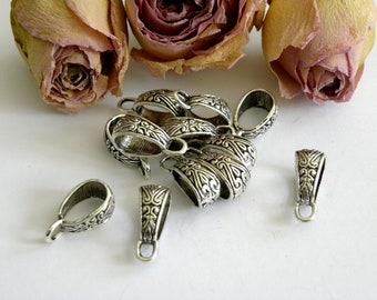 Tibetan silver engraved oval bails 14 X 8 mm x 10