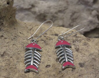 Earrings sleepers fuscia fish skeletons