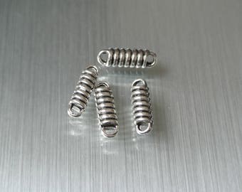 Set of 20 connectors look is 14 x 4 x 2 mm, aged look, two holes for hanging on either silver metal and the other