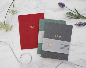 Personalised notebook foil-blocked in gold // handbound in 12 coloured bookcloths