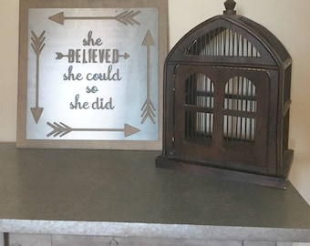 she believed she could so she did metal sign on stained wood background