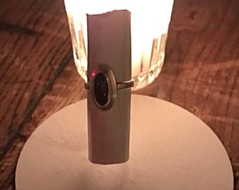 Silver ring inlaid with a cabochon