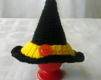 Crochet egg cosy as a witch Hat