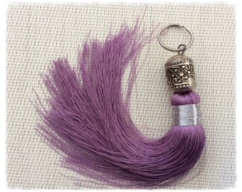 Lilac Pompom with carved metal bead