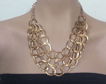 Vintage gold tone bib statement necklace.