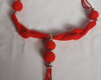 Necklace in carded wool felted with needle