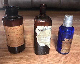 3 antique medicine bottles