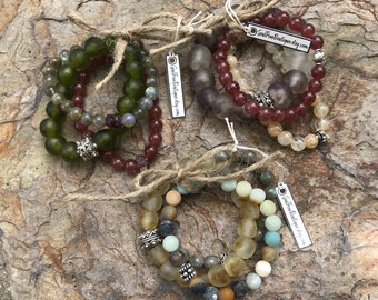 Handmade semiprecious and glass bead bracelets.