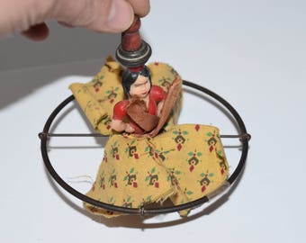 vintage spinner top toy Spanish dancer