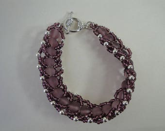 Purple woven glass bead bracelet