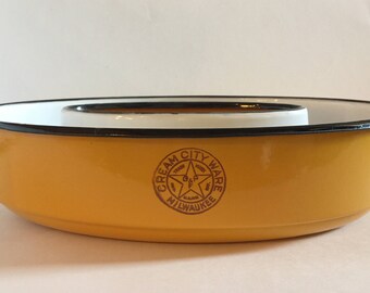 Cream City Ware brand yellow vintage jello mold, oval jello mold