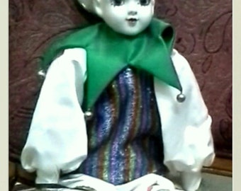 Vintage collectible Harlequin Court Jester Porcelin Doll with built in Jewelry Box