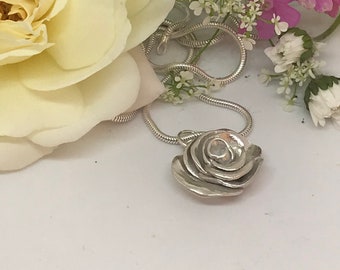 Romantic silver rose pendant