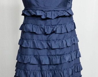 Dress with ruffles trimmed