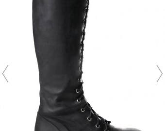 made to order knee high boots with a flat/platform instead and have flames like second picture