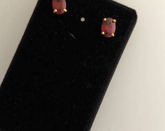Oval garnet stud earrings