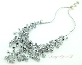 Grey crystal hand knotted on silk necklace.