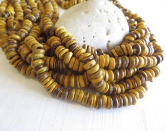 small coconut beads ,small yellow rondelle beads, painted discs, exotic spacer washer 7 to 8mm in diameter / 12 inches strand - 6A15-10