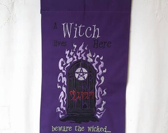 A Witch lives here - decorative banner