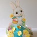 Vintage Hallmark Easter Centerpiece. Vintage Party Supplies. White Bunny With Easter Basket. Yellow Chick and Duckling. Flowers.