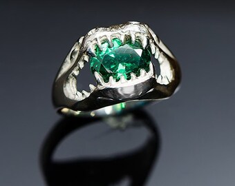 In the jaws of eternity ring