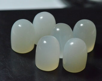 One 14 by 10mm white moonstone smooth bullet cut gemstone cabochon from South India