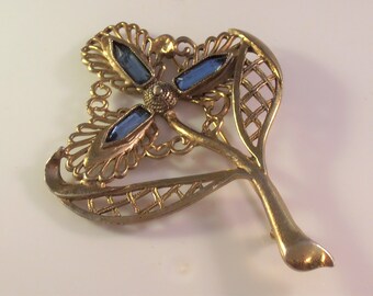 Little Nemo Brooch, Sapphire Blue Rhinestones, Gilt Pot Metal Flower