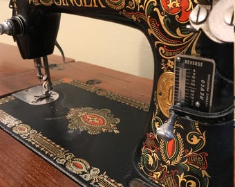 1911 USA Singer "red eye" with motor, desk, foot pedal etc.