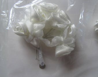 set of 2 bunches of 7 flowers each metal rod - cream colored satin is 14 flowers