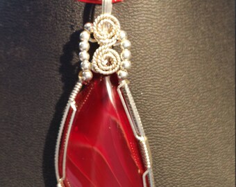 Red glass slag pendant necklace hand wrapped in sterling silver wire