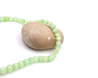 65 6mm light green cat eye beads