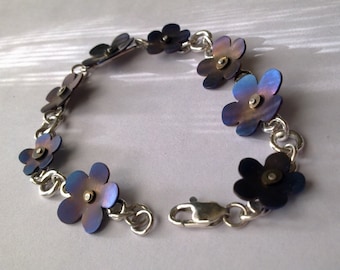 Sterling silver and coloured titanium flower bracelet