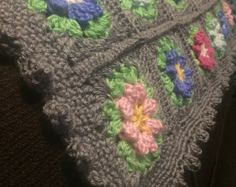 Crocheted colorful flower baby blanket