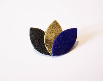 Black leather, gold and dark blue petals brooch