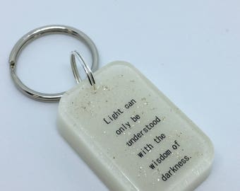 Key ring with power line and glitter