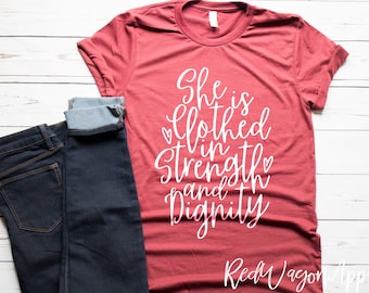 She Is Clothed In Strength and Dignity | Strength and Dignity T- Shirt | Christian T-shirt | Inspirational T-shirt | 143