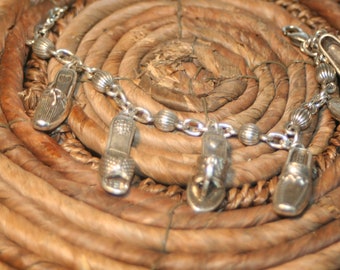 Vintage Brighton charm bracelet. CeMeB...Loving shoes.