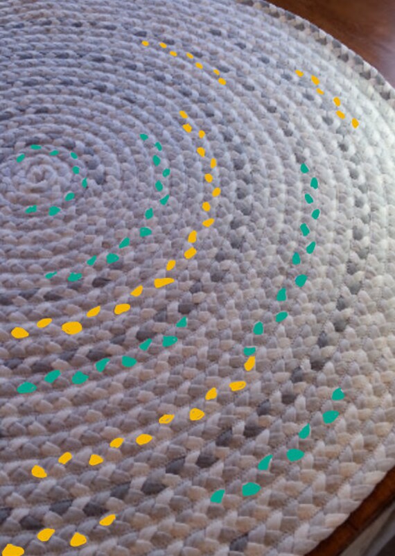 customized hand braided gray rug with accent colors of your