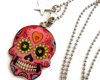 Pink Mexican skull and star pendant